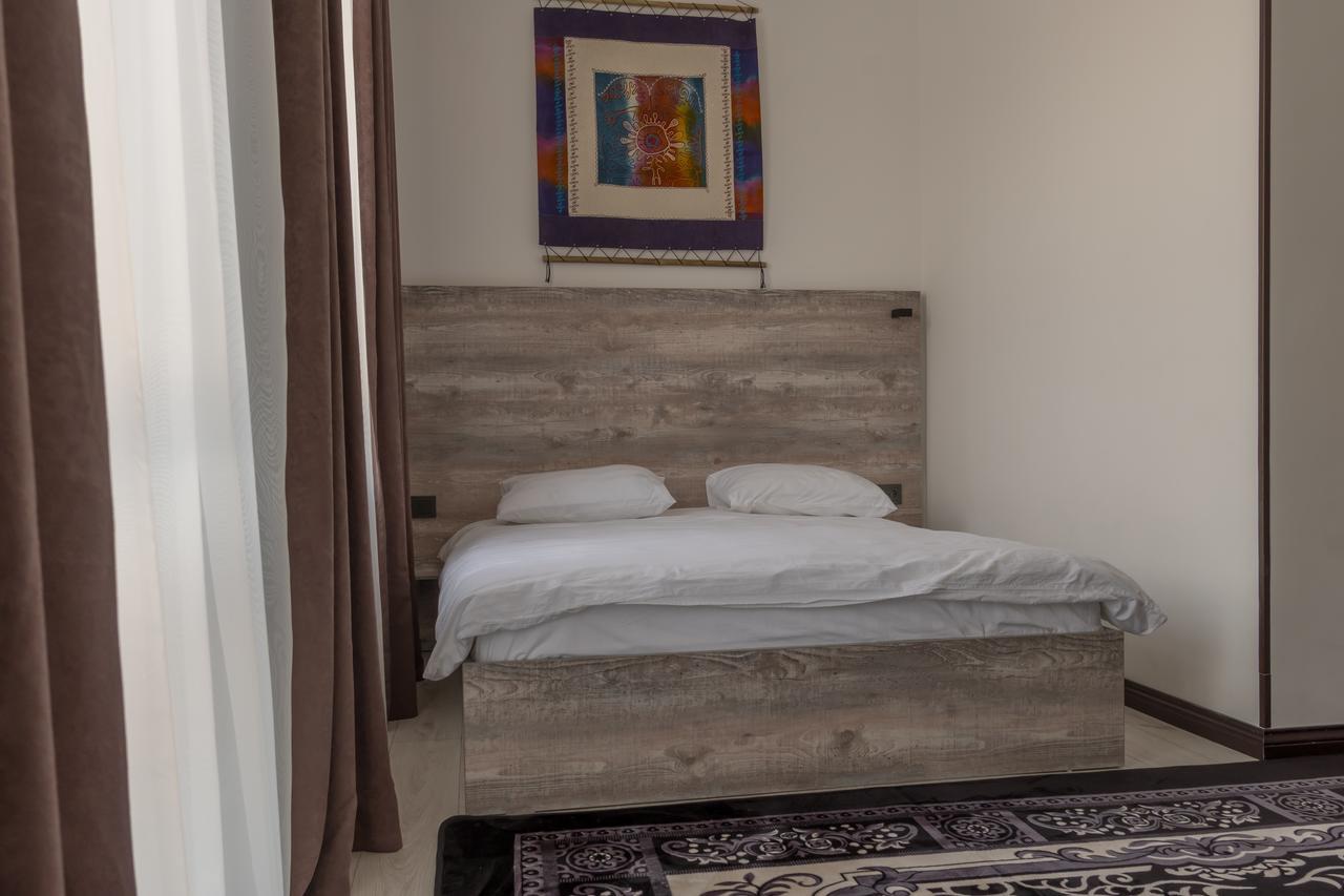 Гостевой дом Home Guest Residence Бишкек Номер фото